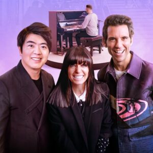 Lanng Lang, Claudia Winkelman & Mike smiling in the foreground, with pianist playing an acoustic upright in the background.