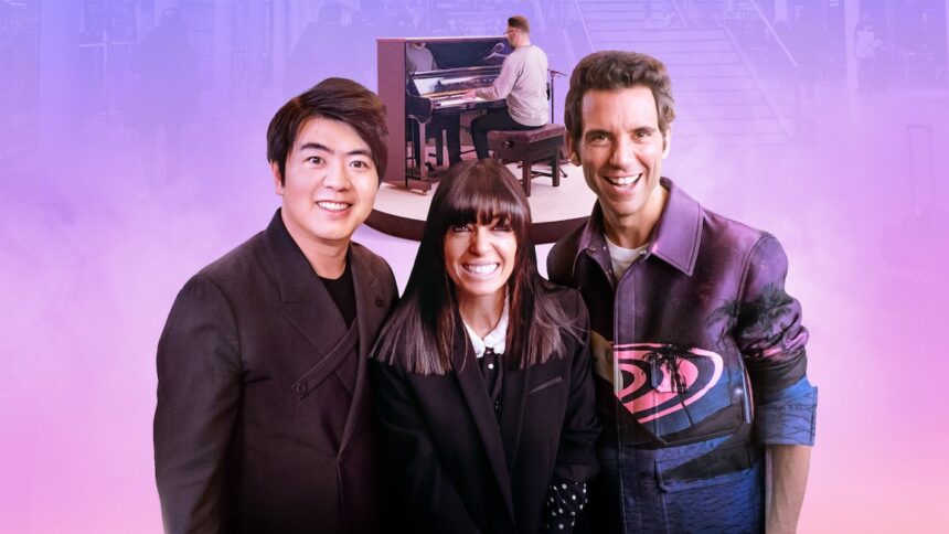 Lanng Lang, Claudia Winkelman & Mike smiling in the foreground, with pianist playing an acoustic upright in the background.